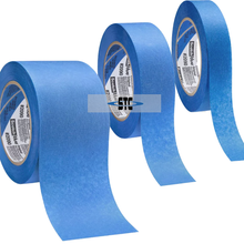 Load image into Gallery viewer, Three rolls of blue painter's tape on a white background with STC logo.
